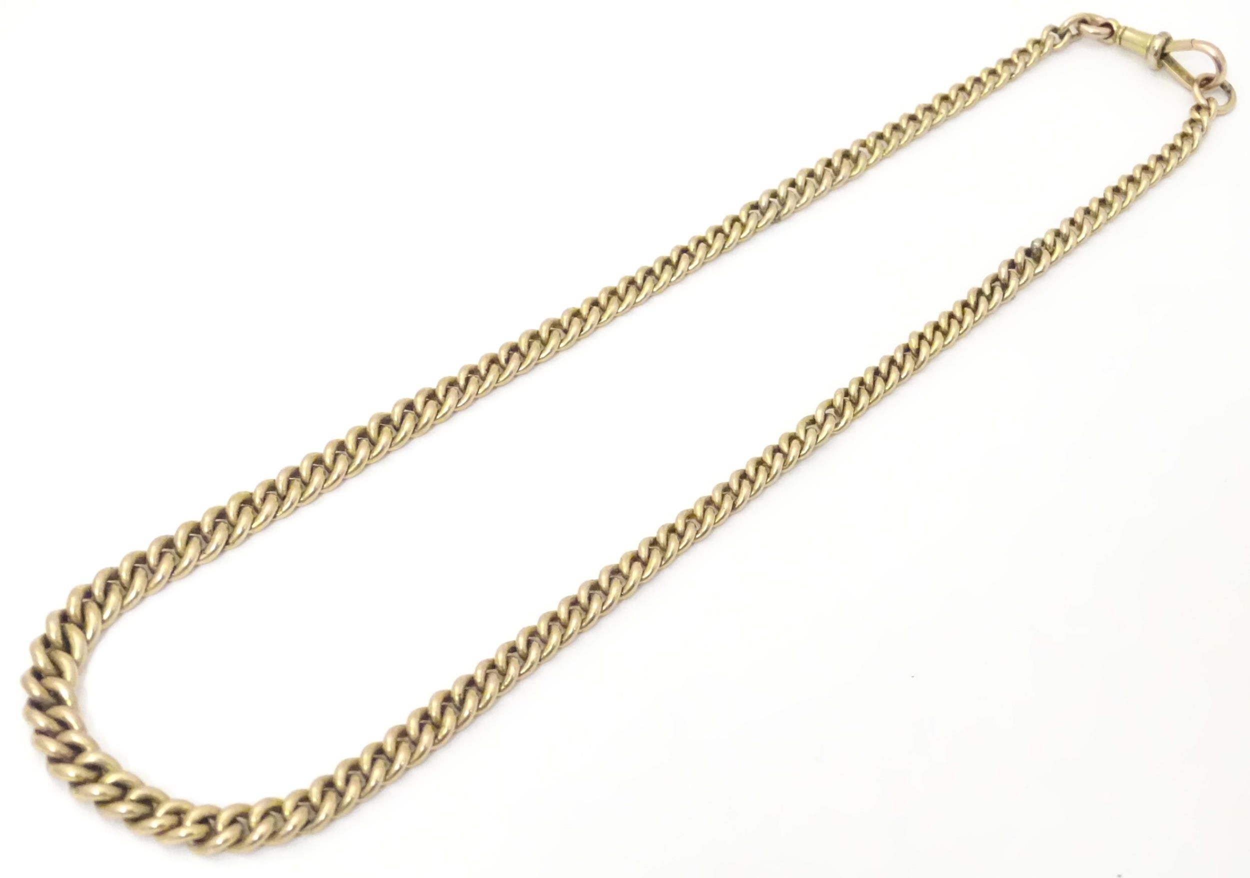 A 9ct gold graduated curblink watch chain. Approx 16" long Please Note - we do not make reference to