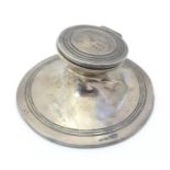 A silver inkwell of capstan form with glass liner and inscription for Southport Division, 1910,