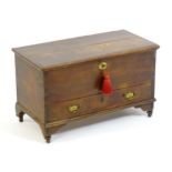 A late 18thC / early 19thC oak mule chest of small proportions, having a moulded lifting lid above a