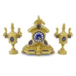 A late 19thC clock and garnitures with blue enamel dial and porcelain detail. The movement by Japy