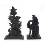 Two cast fireplace / fireside / chimney ornaments / door stops / porters to include a young couple