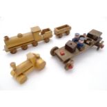 Toys: Three 20thC wooden push along vehicles comprising an Abbatt Toys train with 8 wheels and a