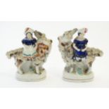 A pair of Victorian Staffordshire pottery figures depicting the Princess Royal, and the Prince of