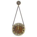 A mid century retro pendant / hanging clock. The dial signed Marquardt. Approx. 87 1/2" diameter
