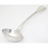 A Victorian silver fiddle and thread pattern ladle, hallmarked London 1859, maker The Portland