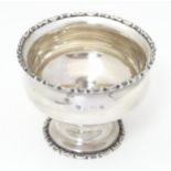 A silver sugar bowl with pedestal foot. Hallmarked Birmingham 1911 maker George Nathan & Ridley