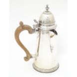 A George V silver coffee / chocolate pot with wooden side handle and hinged domed lid, hallmarked