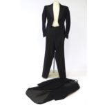 Vintage fashion / clothing: A gentleman's bespoke morning suit with black striped trousers, chest