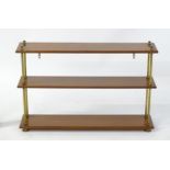 A 19thC walnut etagere / hanging wall shelves with turned brass supports and mounted by brass