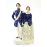 A large Victorian Staffordshire pottery flat back figural group depicting the Princess Royal and Frk