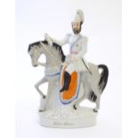A large Victorian Staffordshire pottery flat back figure depicting the Crown Prince on horseback.