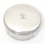 A George IV dressing table pot, the glass pot with silver lid, hallmarked London 1821, maker