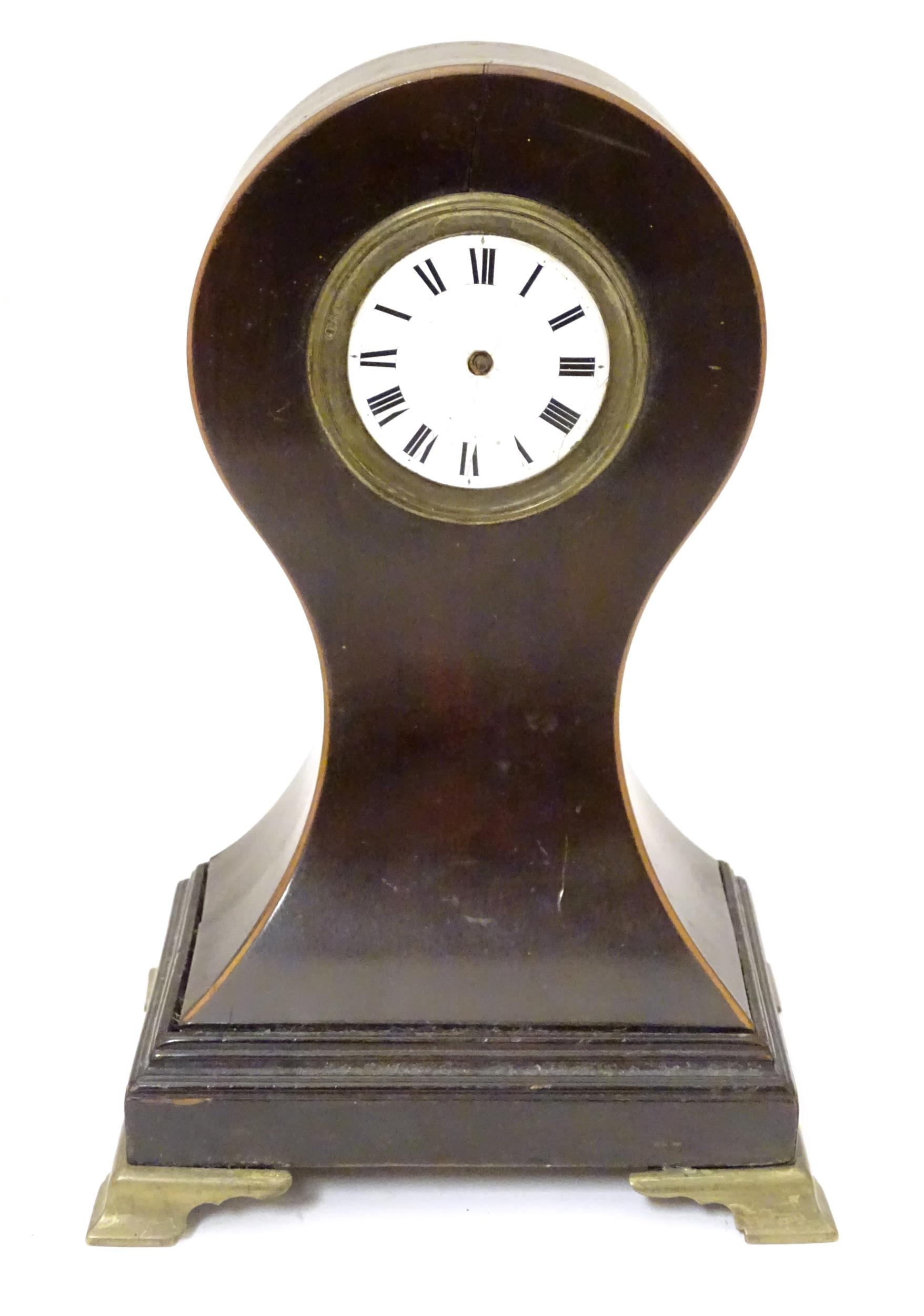 A Victorian pocket watch stand formed as a balloon shaped mantel clock. The whole standing 8 1/2"