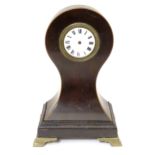 A Victorian pocket watch stand formed as a balloon shaped mantel clock. The whole standing 8 1/2"