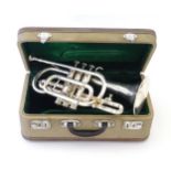 Musical Instrument: a mid to late 20thC H Singhai cornet trumpet, in chromed finish with fitted