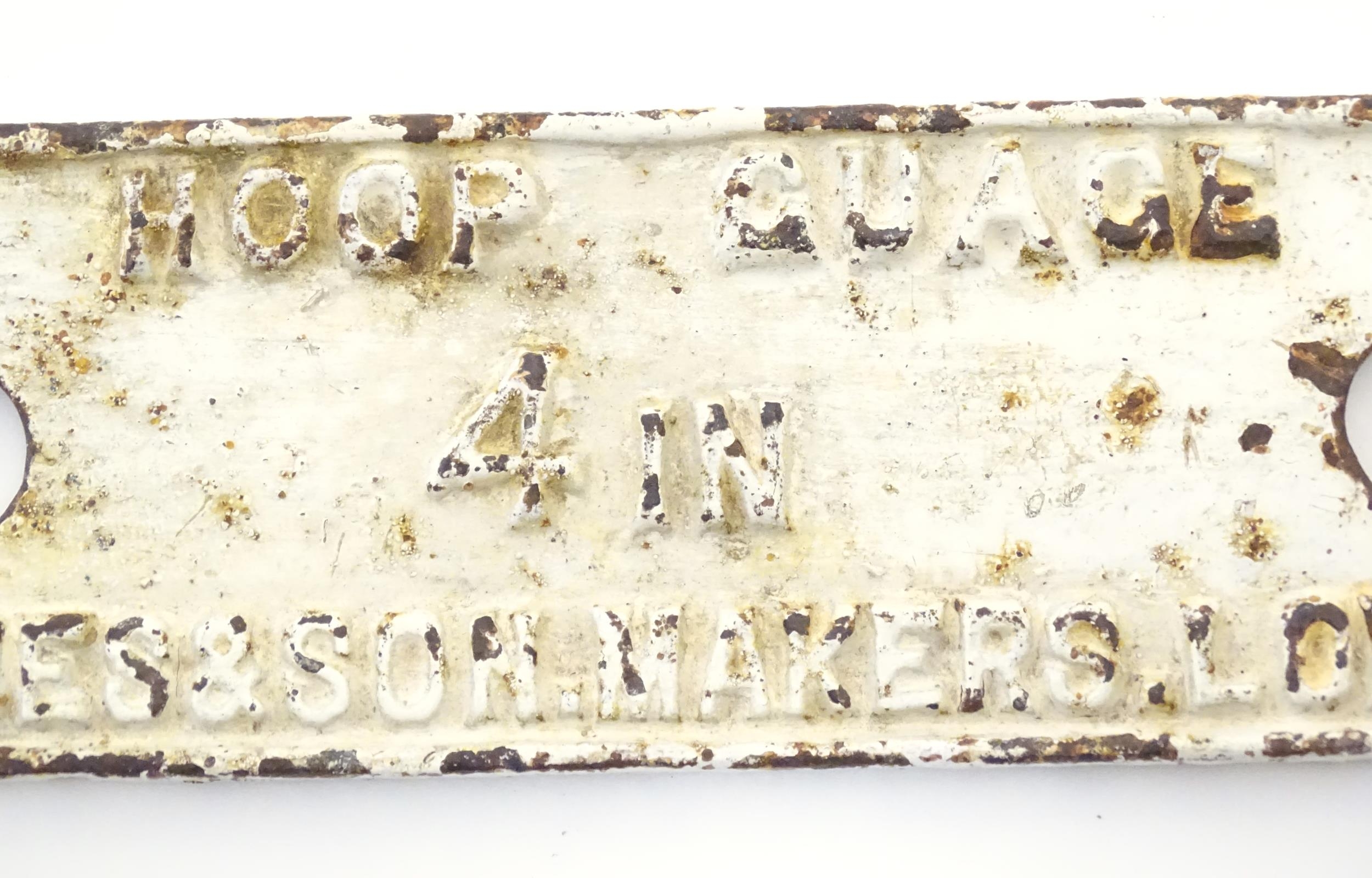 A 20thC cast advertising sign / plaque / name plate for Hoop Gauge 4in, Jacques & Son makers London. - Image 6 of 7