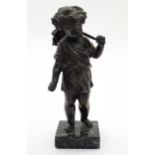 A late 19thC cast bronze figure of a cherub / putto representing Harvest, holding fruiting vines. On