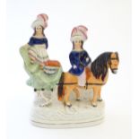 A Victorian Staffordshire pottery flat back figural group depicting the young Prince of Wales and