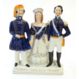 A Victorian Staffordshire pottery flat back figural group Turkey, England, France, depicting