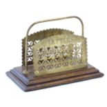 A Victorian brass letter rack with pierced and foliate decoration. Approx. 4 1/2" high x 6 3/4" wide