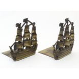A pair of 19thC cast brass book ends modelled as the ship HMS Victory in full sail. Approx. 5 1/2"