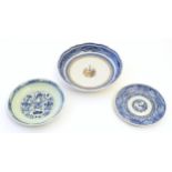 Three Chinese blue and white dishes, to include a dish decorated with underwater scenes with fish