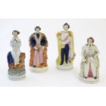 Three Staffordshire pottery figures depicting Prince Albert, one standing, one seated wearing a