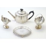 A George III Scottish silver three piece tea set comprising teapot, teapot stand, and sugar with