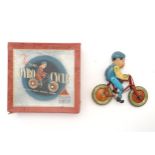 Toy: An early 20thC Lines Brothers / Tri-Ang Gyro Cycle, with a tinplate bicycle and celluloid rider