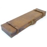 Shooting: a mid to late 20thC gun/rifle motor case, the tan leather exterior with brass reinforced