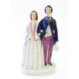 A large Victorian Staffordshire pottery flat back figural group depicting the Prince and Princess.