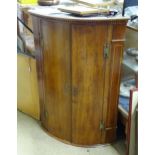 A 19thC oak and mahogany curved front corner cabinet. Approx. 27 1/2" wide x 38 1/2" high Please