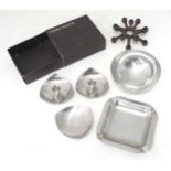 A boxed ornament by Dansk designs. Together with 5 stainless steel items to include pin dish, candle