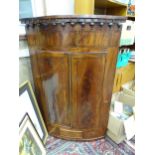 A Georgian mahogany corner cupboard. Approx 34 1/2" wide x 50" high Please Note - we do not make