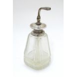 A cut glass scent / perfume atomiser with mounts marked ' Sterling Silver ' 6 3/4" high overall.