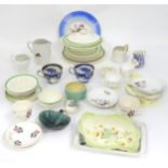 A quantity of assorted dinner and tea wares to include plates, serving bowls, cups, jugs, cups,