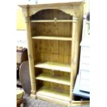 A pine bookcase with five shelves. Approx. 78" high x 42 1/4" wide x 16 1/2" deep Please Note - we