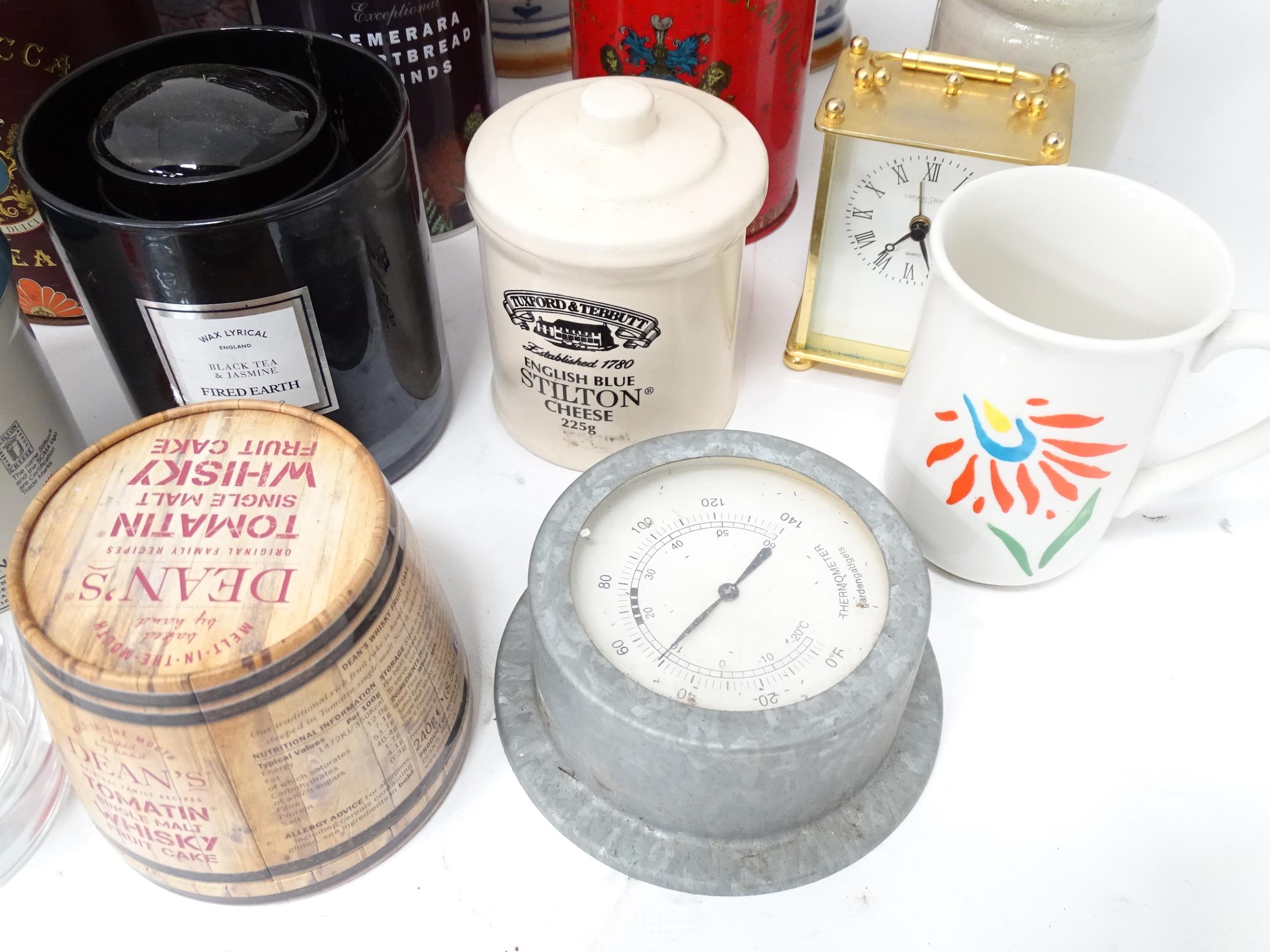 A box of miscellaneous items to include tins, ceramics, clocks, etc. Please Note - we do not make - Image 3 of 7