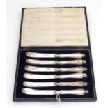 A set of 6 Art Nouveau silver plate knives, each approx. 6 1/4" long Please Note - we do not make