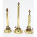 Three cast brass table lamps, two with column detail to stem. Largest approx. 20 1/4" high (3)
