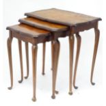 A 20thC mahogany nest of three tables with cabriole legs. Largest approx. 20 1/2" wide x 14 deep x