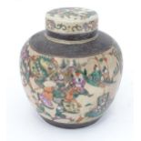 An Oriental ginger jar decorated with a landscape battle scene with figures, horses, etc. Approx