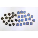 A quantity miniature plaques with enamel decoration formed as stars and shields Please Note - we