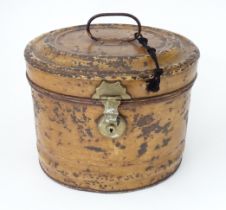 A 19thC tin hat box. Approx. 13 1/2" wide Please Note - we do not make reference to the condition of