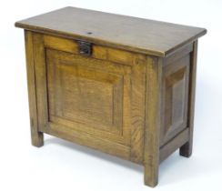 An oak cupboard. Approx. 26" wide Please Note - we do not make reference to the condition of lots
