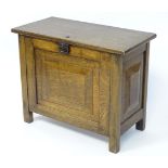 An oak cupboard. Approx. 26" wide Please Note - we do not make reference to the condition of lots