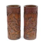 Two carved bamboo vases. Approx 11 3/4" high (2) Please Note - we do not make reference to the