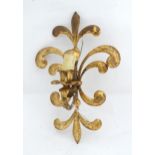 An electric light wall fitting formed as a candle sconce with a gilt mount. Approx. 14 1/2" high