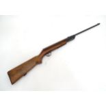 A mid 20thC .22 air rifle Please Note - we do not make reference to the condition of lots within