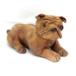 A Novelty door stop modelled a dog. Approx. 15 1/2" long Please Note - we do not make reference to